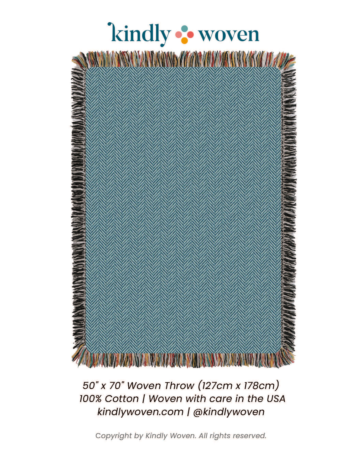 Full view of Henry Chambray blue herringbone reversible woven throw blanket with fringe