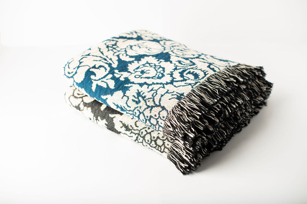 Verona damask floral woven throw blankets stacked in two colorways